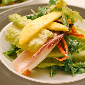 Birthday dinner mango salad side shot.