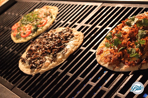 Pizzas Getting Crispy on the Grill