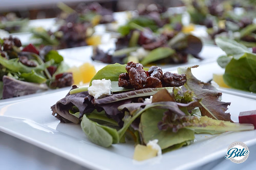Plated Mixed Greens Beet Salad with goat cheese and candied walnuts