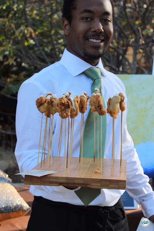 Server Tray Passing Vertical Artichoke Beignets