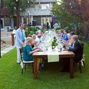 Intimate family-style wedding reception dinner