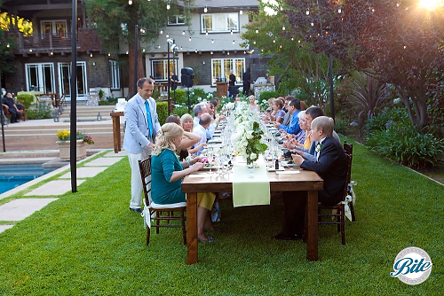 Intimate family-style wedding reception dinner