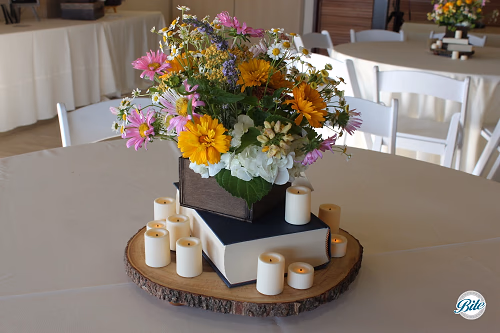 Table centerpieces - books and woodland theme