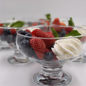 Mixed berries with freshly whipped cream