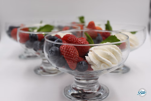 Mixed berries with freshly whipped cream