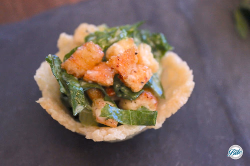Mini Caeser Salad in Parmesan Cup
