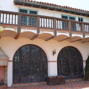 Rear of Adamson House with decorated doors and balcony