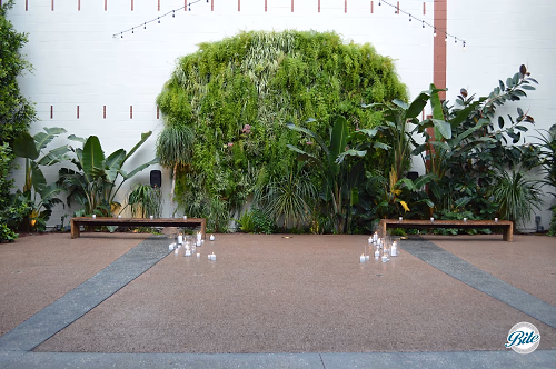 Courtyard Garden @ Millwick w/ candles for ceremony