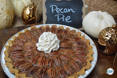 Pecan Pie Against Holiday Backdrop