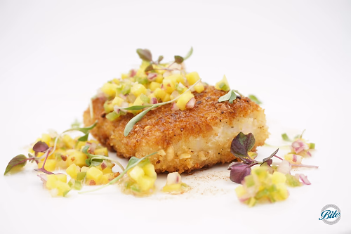 Mahi Mahi plated w/ mango salsa from side
