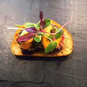 Grilled flank steak crostini closeup