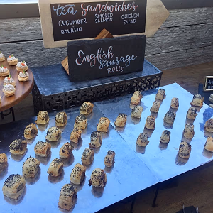 English Sausage Rolls on metal risers