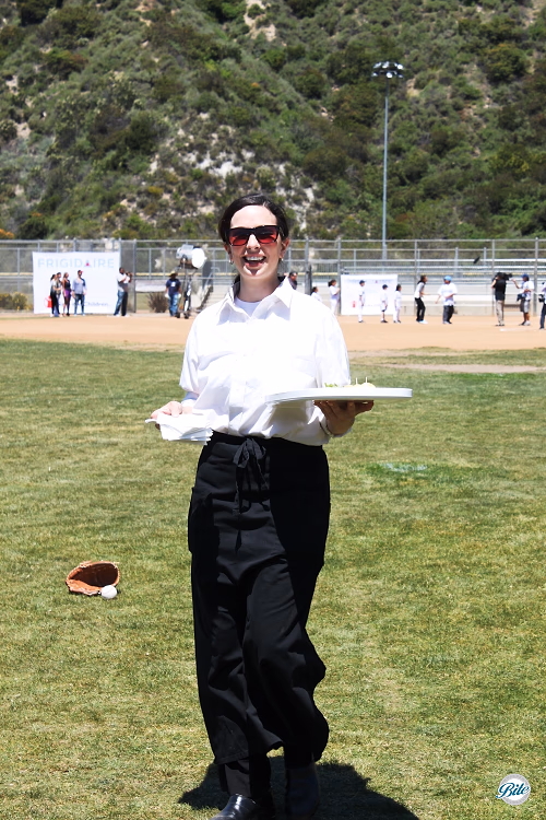 Server Walking Across Field