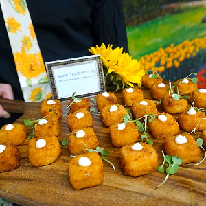 Passed Mac n Cheese Bites on Wooden Peel