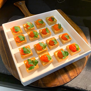 Tomato and Herb Tarts in White Bowl