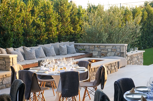 Outdoor lounge area with firepit