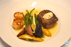 Steak and Scallops Plated with Vegetables