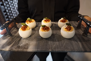 Bacon blue cheese devilled egg with asparagus