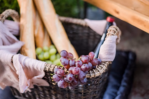 French baguette in elegant picnic basket
