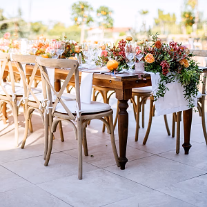 A summer-filled tablescape bursting with floral and fresh citrus