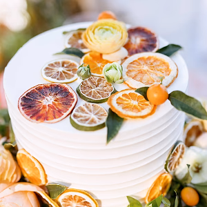 Simply perfect citrus and floral garnished custom wedding cake