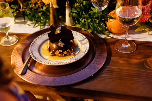  A show stopping chocolate-passionfruit dome dessert fora spectacular micro wedding meal finish