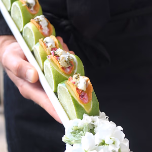 Mini fish taco served on fresh lime