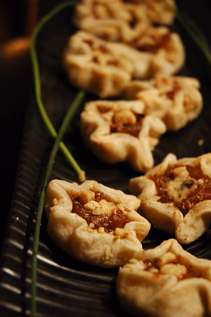 A delicious caramelized french onion tart with walnuts and blue cheese