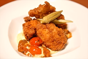 Tea-brined buttermilk fried chicken, smoked gouda grits, stewer tomatoes and okra