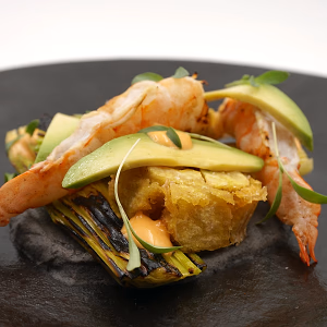 Grilled Prawn with crispy plantain, charred leek, chili aioli, avocado
