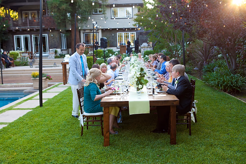 Long family-style wedding table for summer wedding