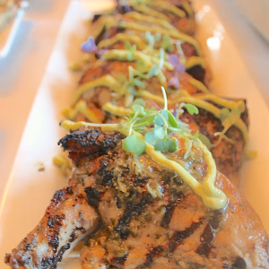 Tequila-lime grilled Jidori chicken with avocado crema and micro cilantro