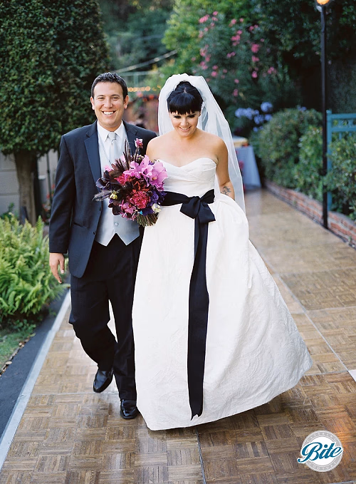 Happy Couple Walking Down the Aisle
