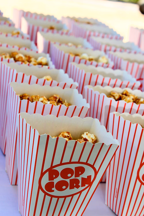Caramel corn served in individual popcorn boxes