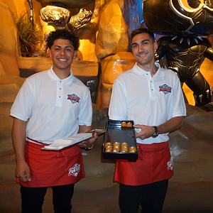 Staff dressed in carnival themed garb