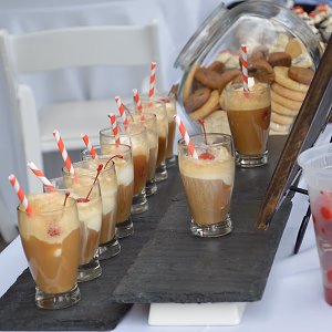 Mini root beer floats and cookies in a self serve station