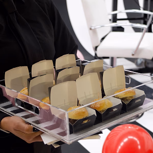 mini sliders passed in take out boxes