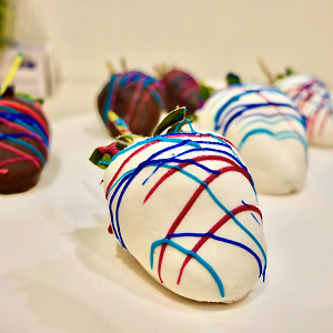 Decorated white and dark chocolate covered strawberries