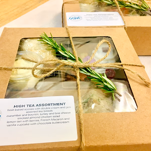 Individually packaged high tea assortments ready for delivery