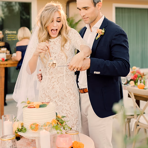 Bride and groom during the cake cutting 