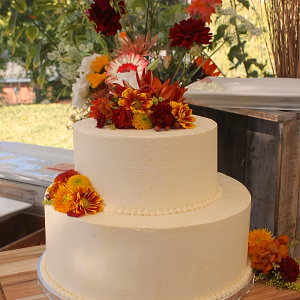 Tiered wedding cake with floral decor