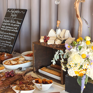 Starters display station with cheese, charcuteries, and accompaniments