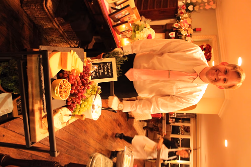 Server pushing a cheese cart