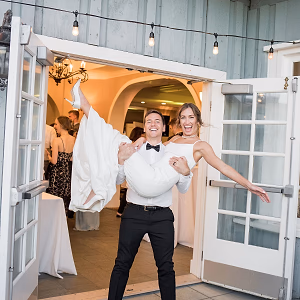 Groom Carries New Bride