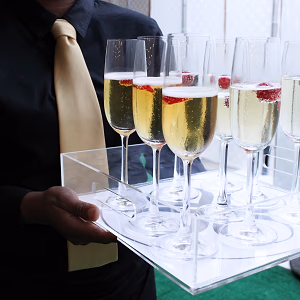 Server passing champagne