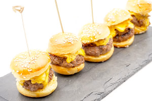 Mini bbq bacon cheeseburgers on brioche buns