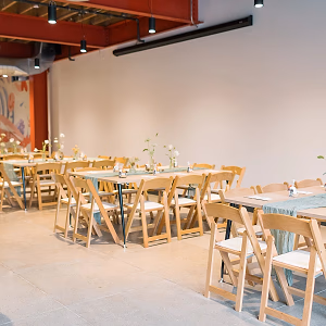 Event Space With 72″ x 48″ Rectangle Tables and Rented Folding Chairs