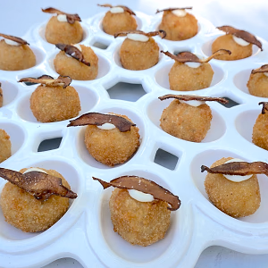 arancini di riso - mushroom risotto croquettes stuffed with italan cheese, truffle aioli