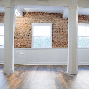Exposed brick walls of Parlor