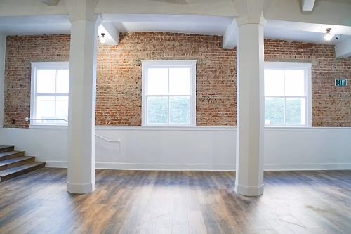 Exposed brick walls of Parlor